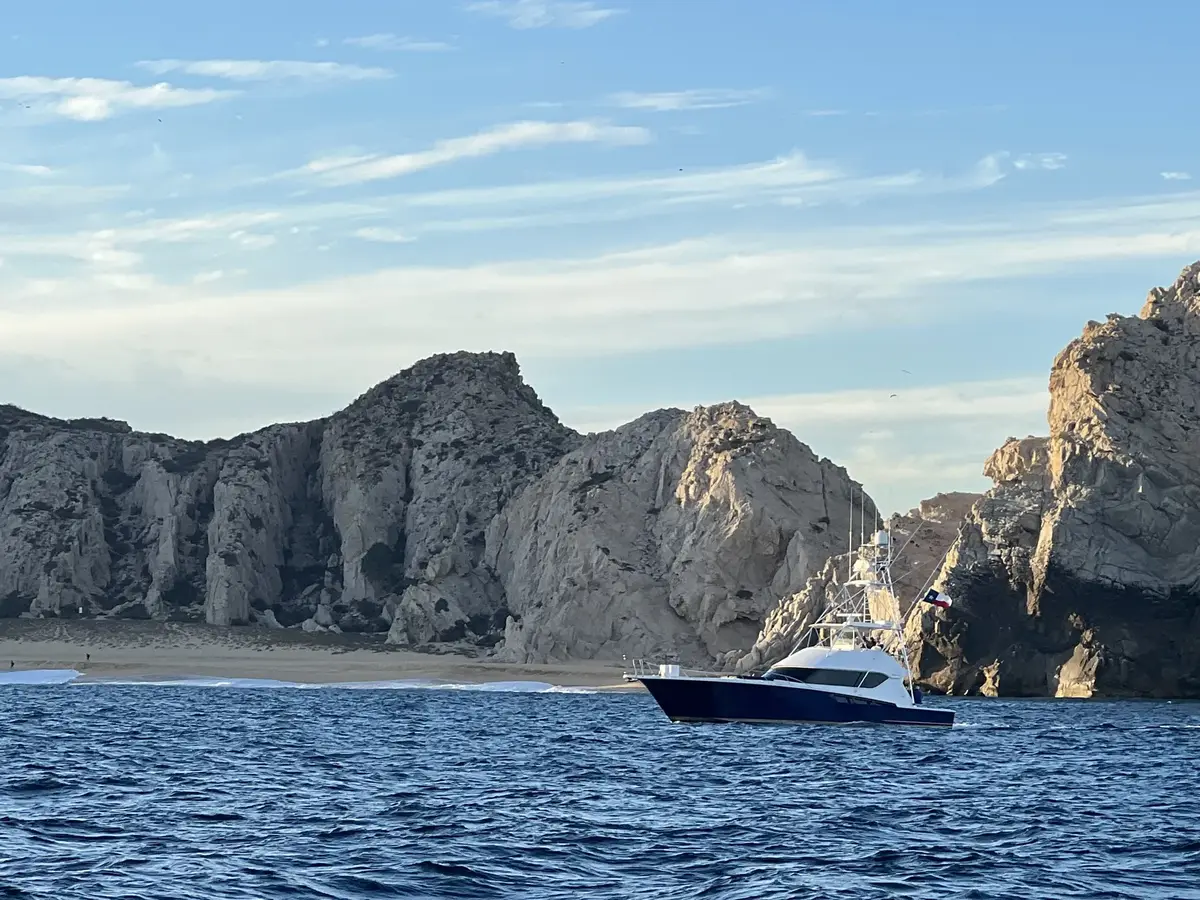 Cruising past Land's End rock formations